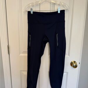 Navy Athleta Rainier Tight with Zipper Pockets